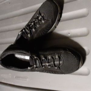 Black Skechers.  Size 7.